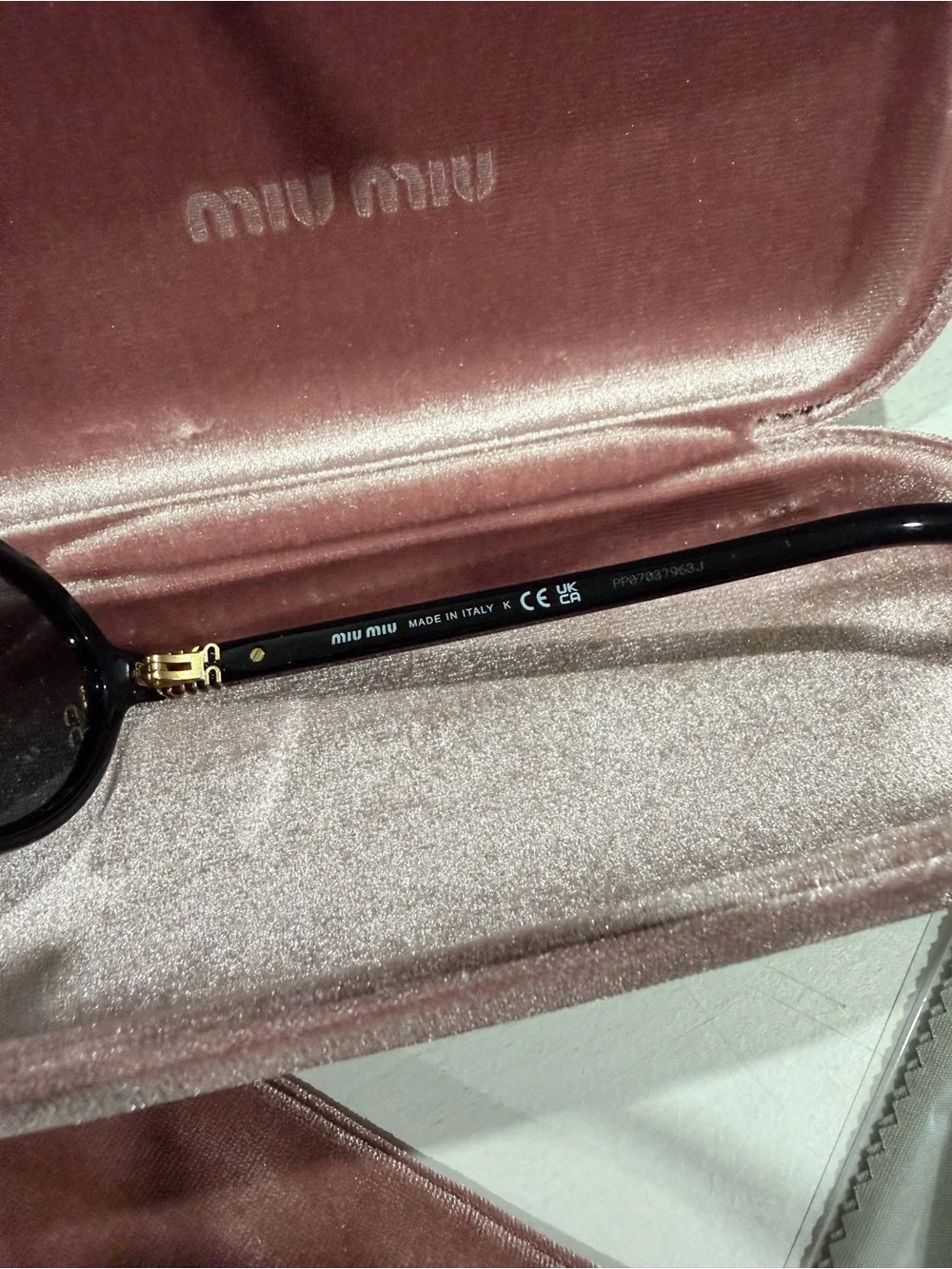 Miu Miu Black Oval Sunglasses with Pink Velvet Case